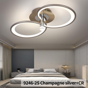 Plafoniera LED cu inele montata pe tavan in dormitor modern, lumina calda uniforma