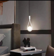 Lustra suspendata pe cablu, design picatura, finisaj alb mat, soclu E14, glob opal, suspendata deasupra noptierei