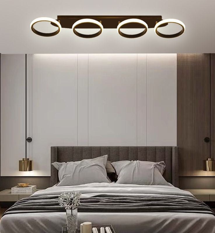 Lustra LED 88W cu 4 inele negru-auriu, montaj tavan, lumina reglabila 3000K-6500K, telecomanda WiFi, dormitor modern