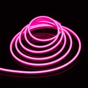 Banda LED Neon Flex roz, 5m, IP65, lumina continua uniforma, rulata pe fundal negru