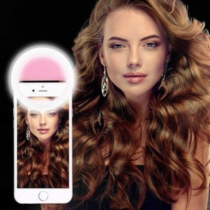 Ring light LED roz prins pe telefon, iluminare uniforma pentru selfie portret