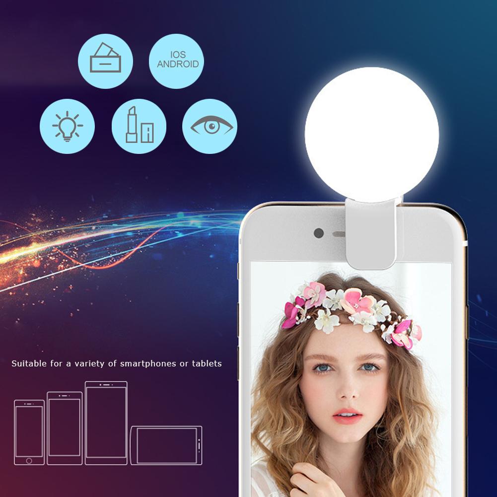 Lampa LED selfie clip-on montata pe smartphone, compatibila iOS si Android, lumina uniforma pentru selfie
