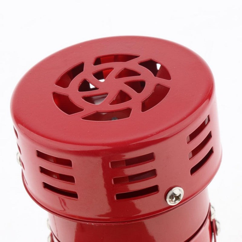 Detaliu rotor cu palete al sirenei alarma, grila superioara din metal rosu