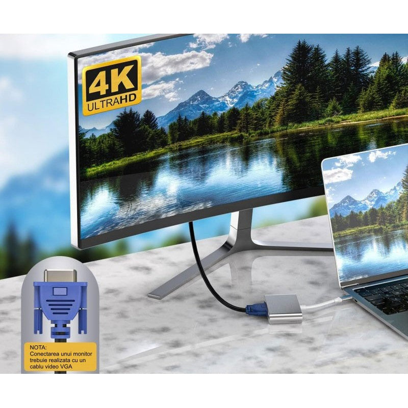 Adaptor USB-C la VGA conectat la laptop, afisand imagine 4K Ultra HD pe monitor extern