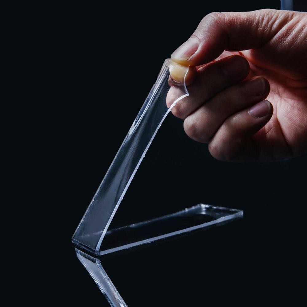 Banda dublu adeziva transparenta de 2mm grosime, elastica si rezistenta, dezlipita de pe suprafata