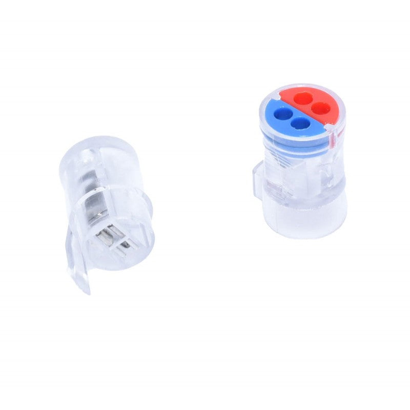 Conector rapid fire electrice dezasamblat, contacte metalice vizibile, capac cu orificii color rosu-albastru