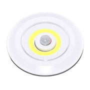 Lampa LED COB rotunda cu senzor PIR integrat, alimentata cu baterii, lumina alba, design compact