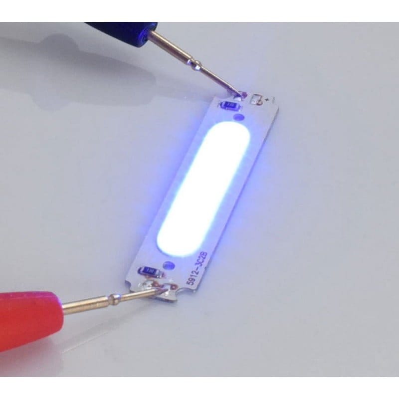 Chip LED COB albastru 2W, 58x13mm, 6 segmente, alimentat la 12V DC, testat cu sonde de masura
