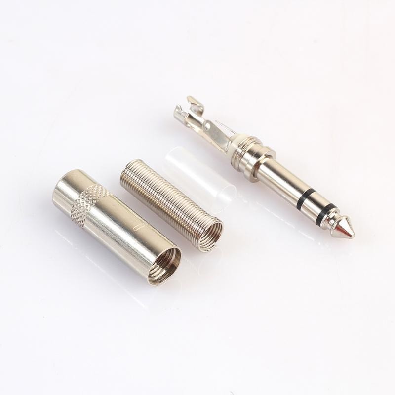 Componente demontate mufa Jack 6.3mm stereo: manson filetat, arc spiralat si cap cu pini de lipit