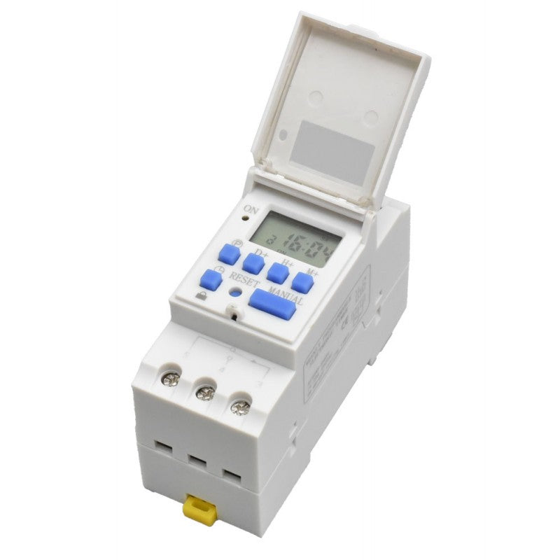 programator de timp pe sina DIN cu capac rabatabil deschis, butoane RESET si MANUAL accesibile